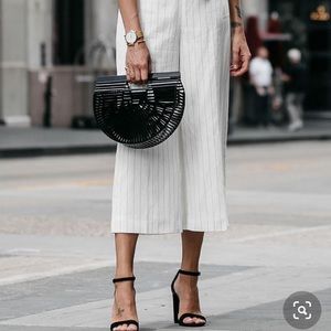 Black faux bamboo cage bag